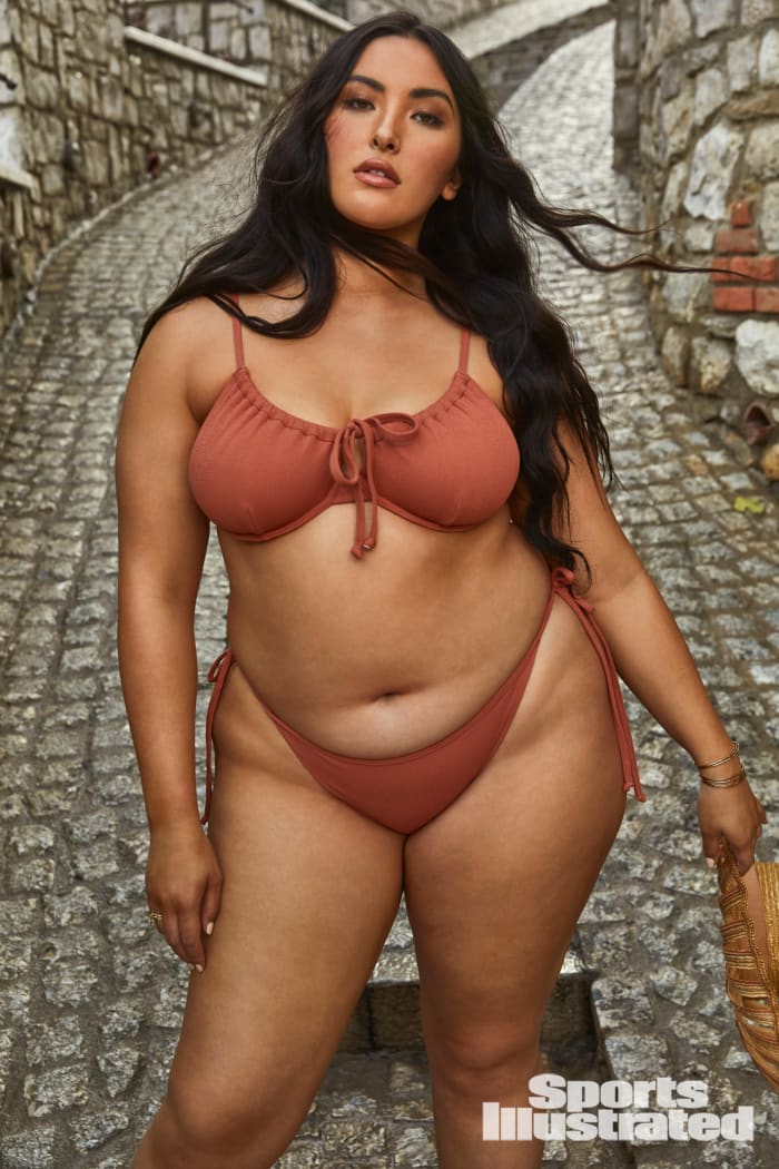 Yumi Nu was photographed by James Macari in Montenegro. Swimsuit by Toluca Swim. Hat by New York Vintage. Bracelets and rings by SOKO.